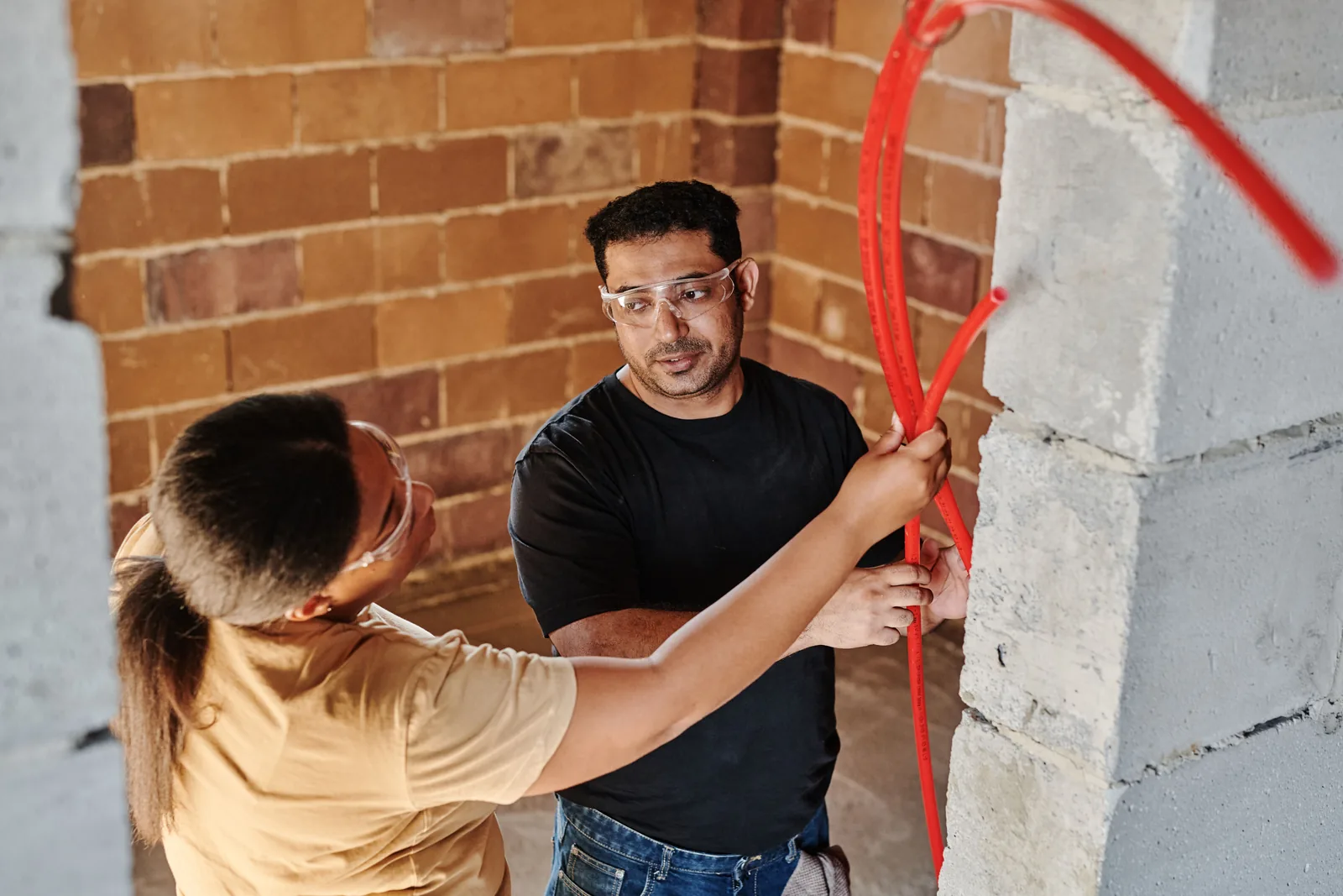 Running conduit across a block wall, for ev rebate in Buffalo